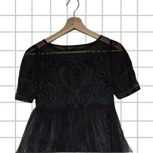 Elegant Black Mini Dress with Sleek Silhouette